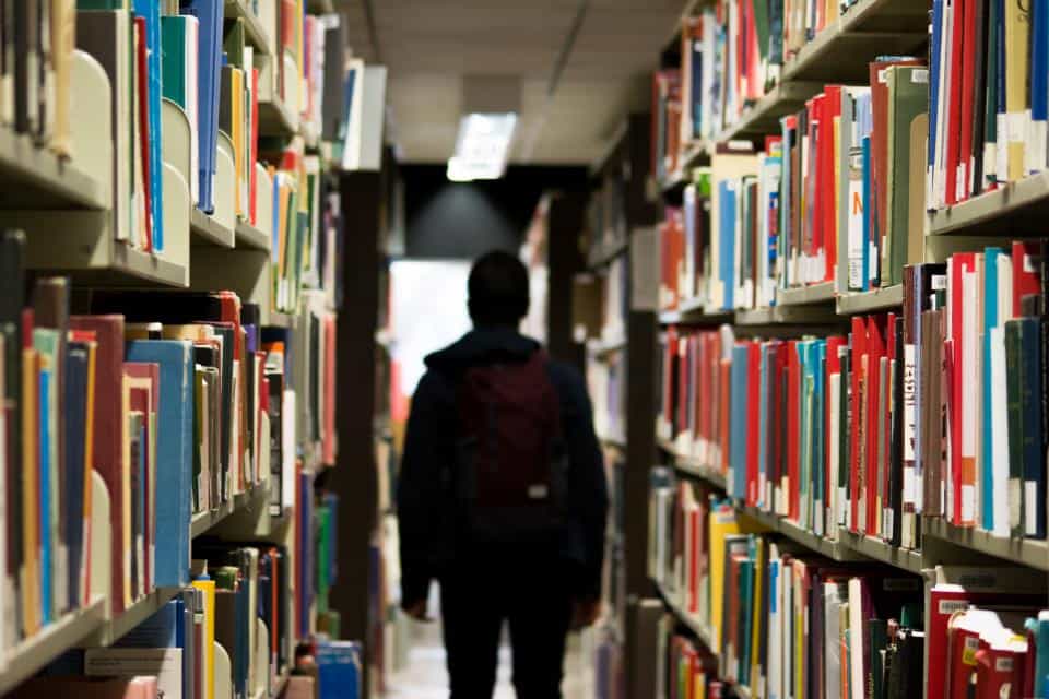 looking for books in library