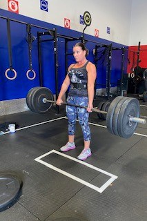 woman deadlifting